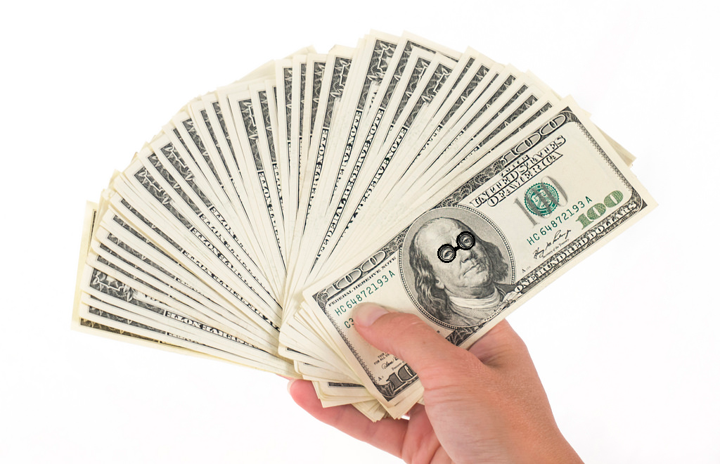 100 dollars with glasses