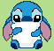 stitch cuddling a pillow